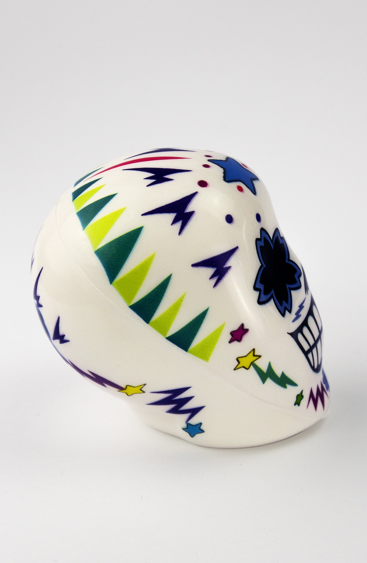 Pallina Antistress  a forma di teschio bianco con decorazioni colorate