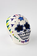 Pallina Antistress  a forma di teschio bianco con decorazioni colorate