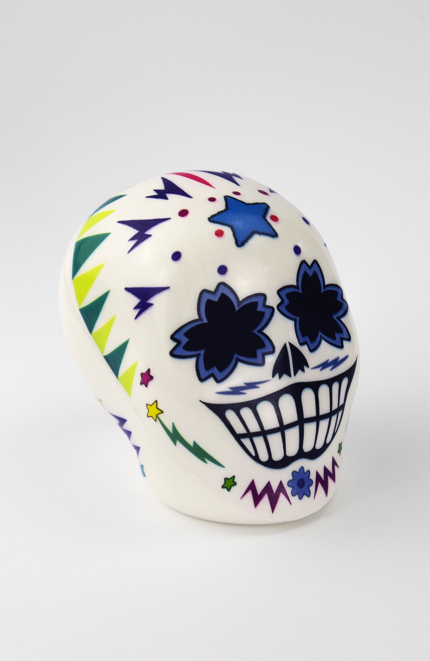 Pallina Antistress  a forma di teschio bianco con decorazioni colorate