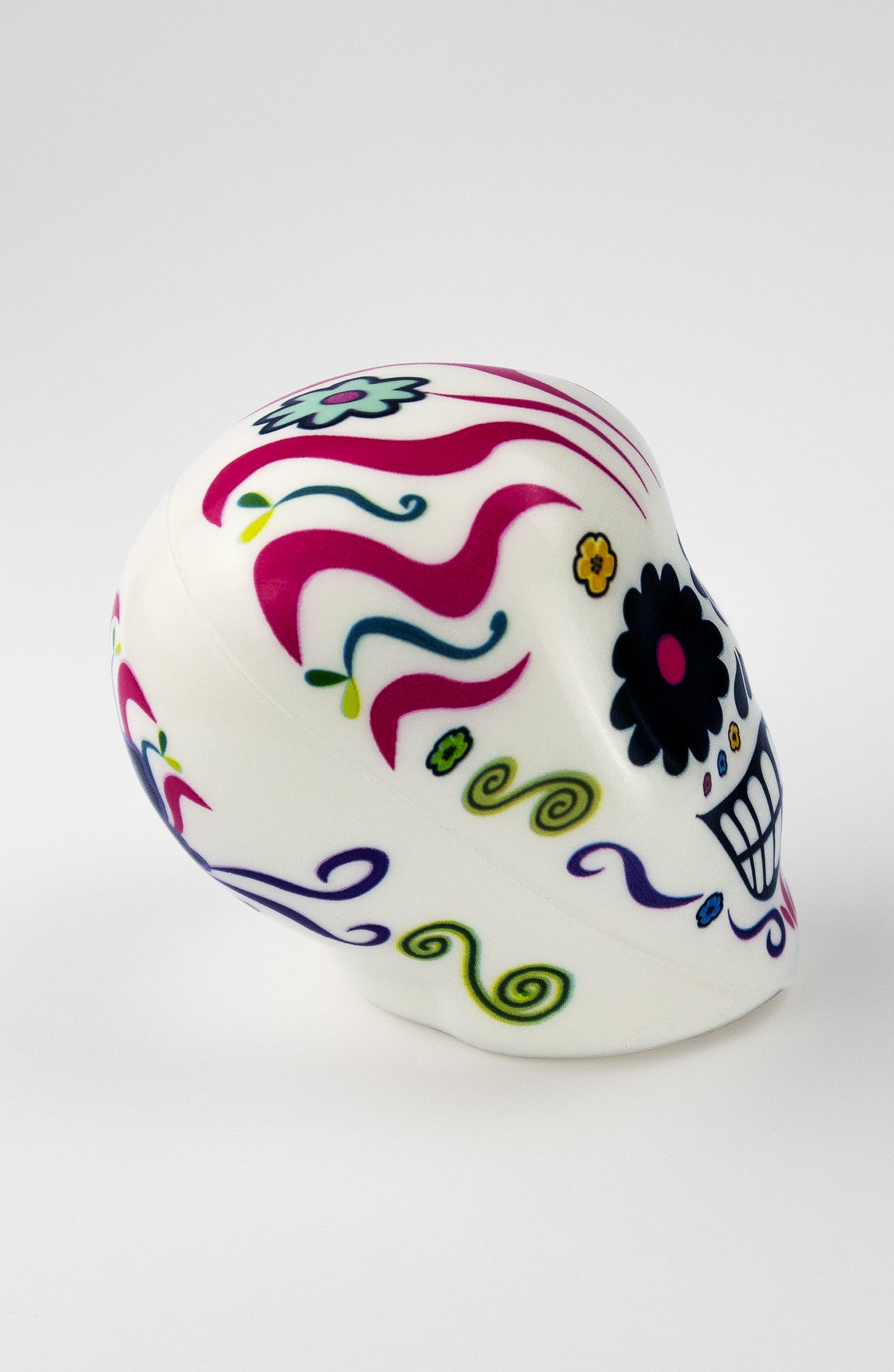Pallina Antistress a forma di teschio bianco con decorazioni rosa