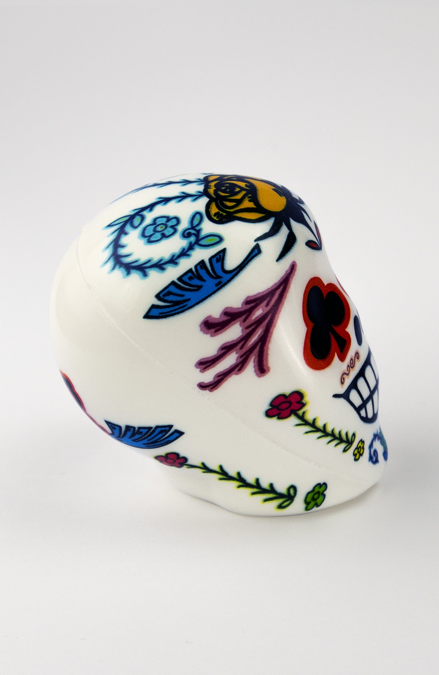 Pallina Antistress a forma di teschio bianco con occhi floreali