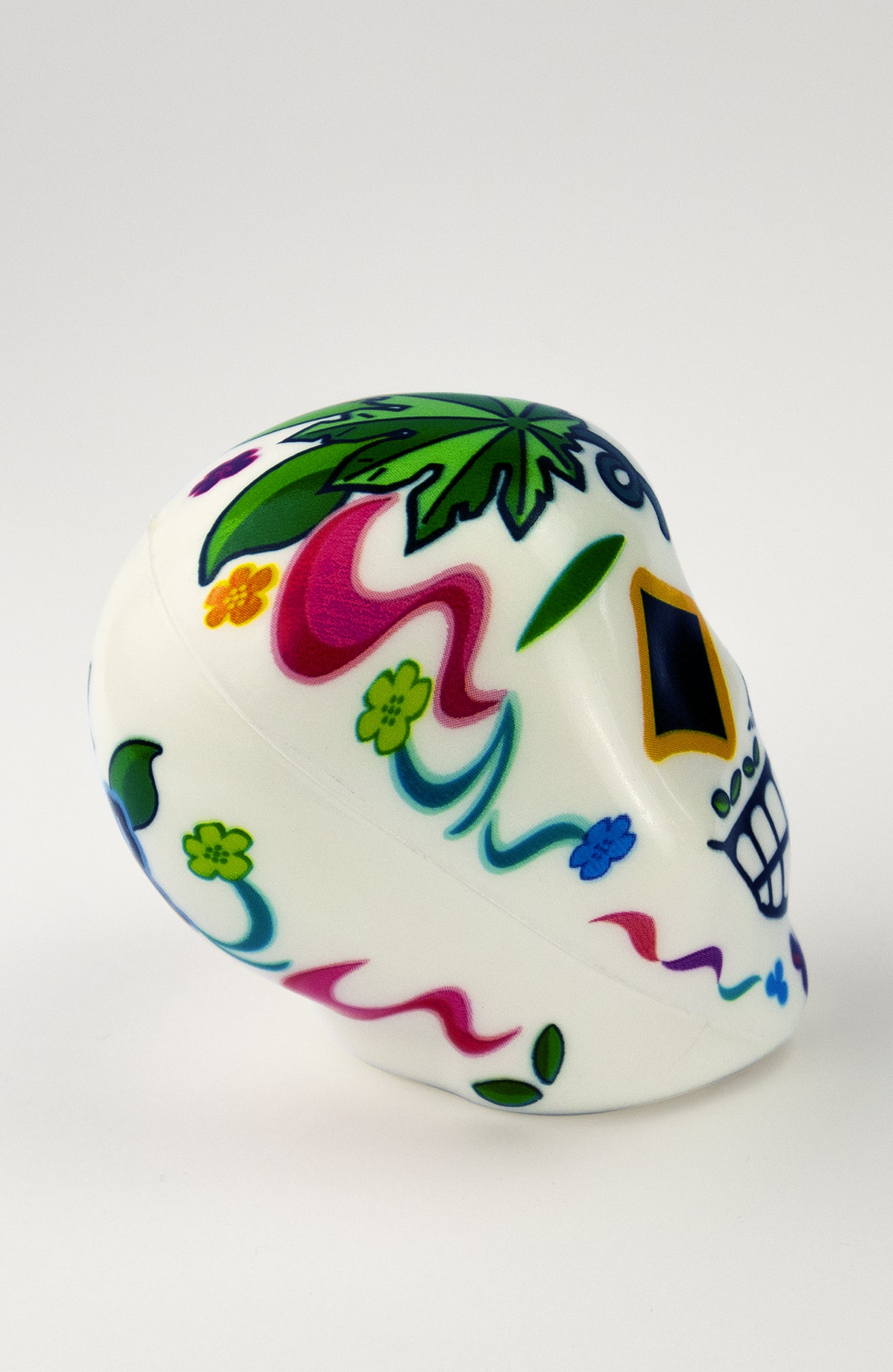 Pallina Antistress a forma di teschio bianco con occhi gialli