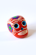 Teschio Calavera rossa con decorazioni floreali