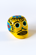 Teschio Calavera giallo con decorazioni floreali